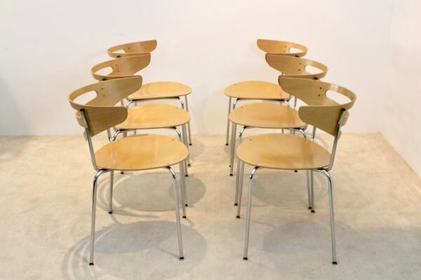 Thonet curved dining chairs stacked in chrome and beech