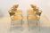 Thonet curved dining chairs stacked in chrome and beech
