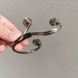 Small candle holder in tarnished silver, with place for three small candles