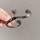 Small candle holder in tarnished silver, with place for three small candles