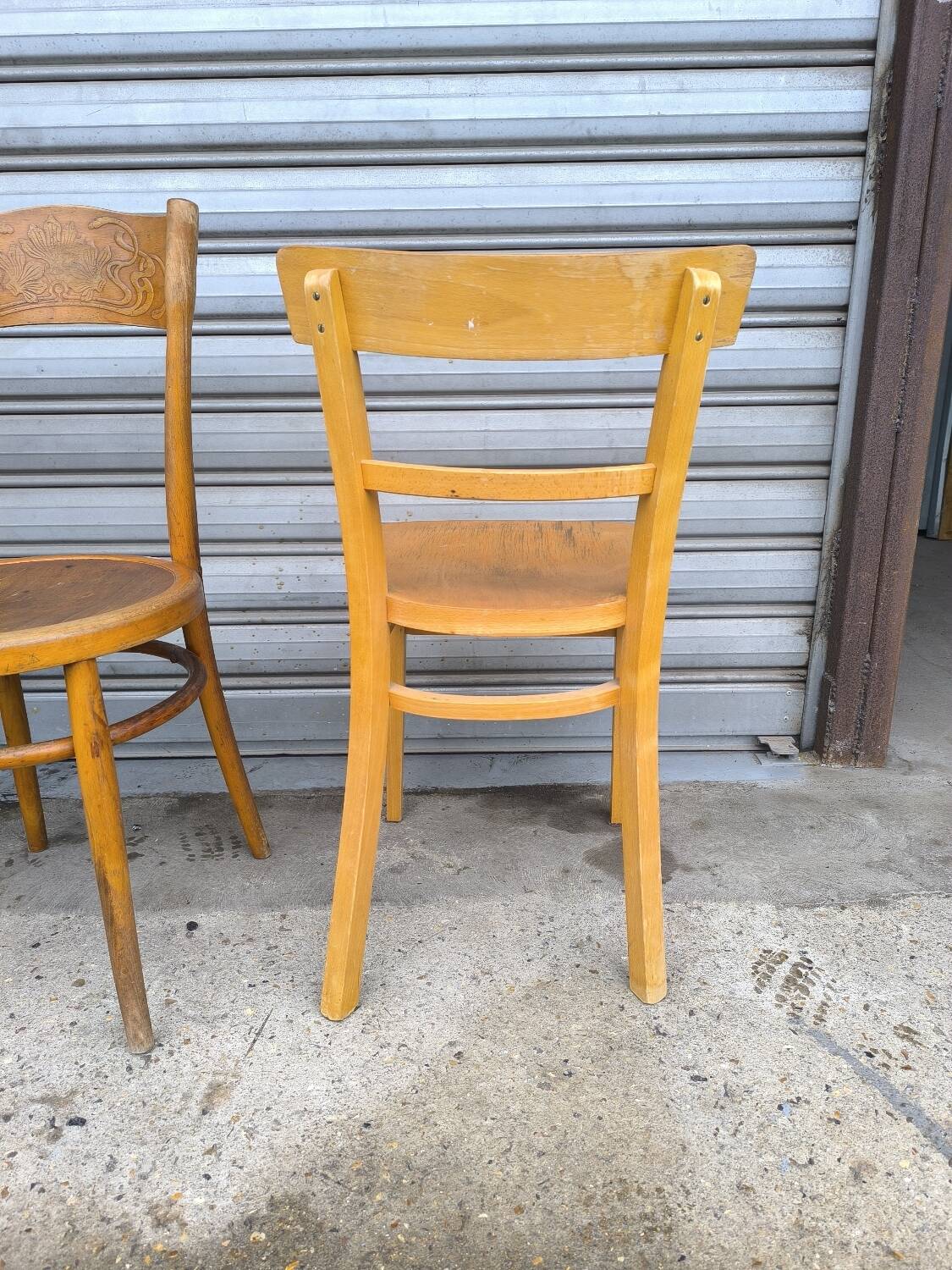 Set of four mismatched bistro chairs