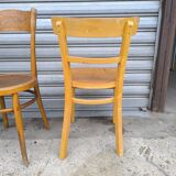 Set of four mismatched bistro chairs