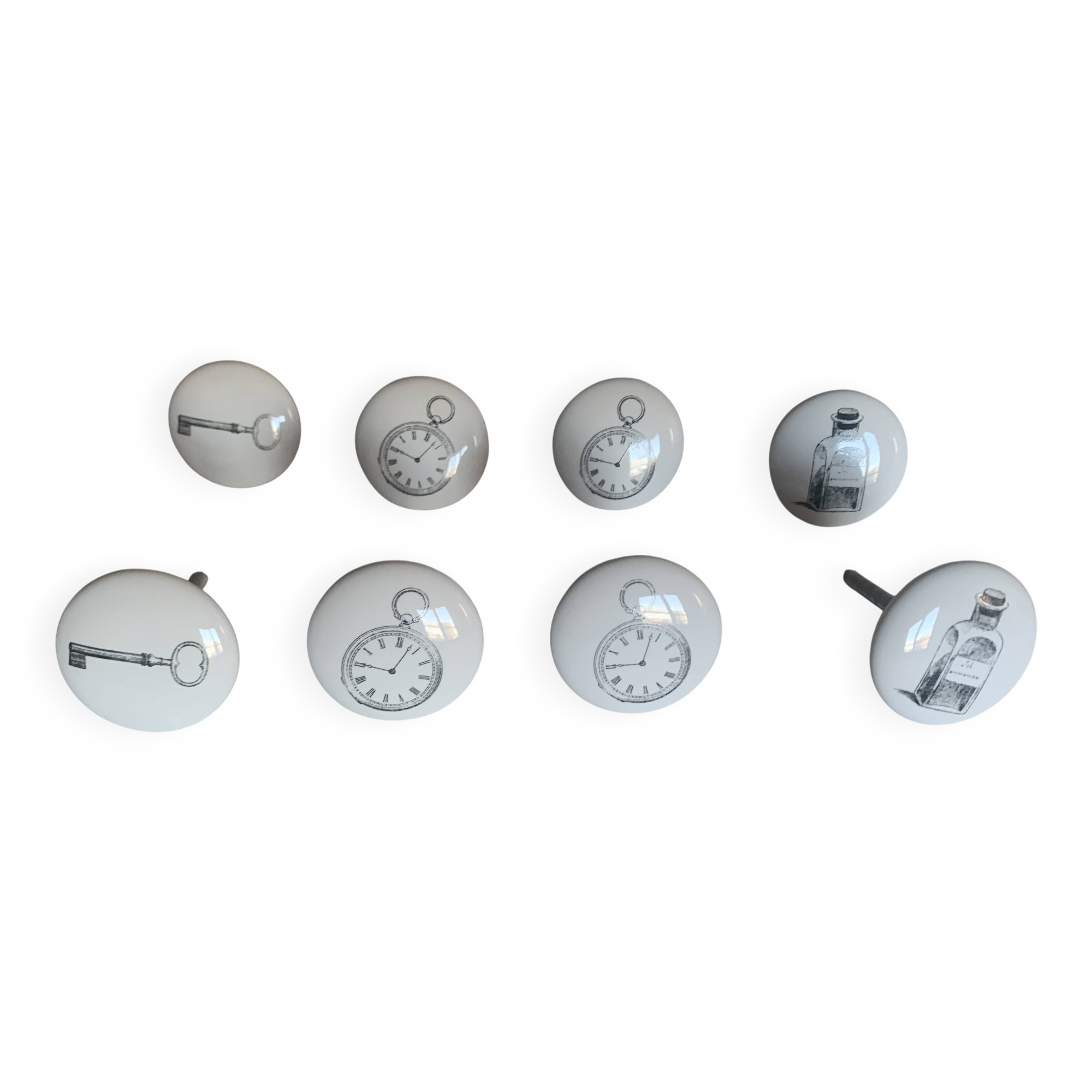 white ceramic door knobs with illustration