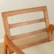 Elegant mid-century armchair from the 1960s with cream-white upholstery