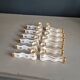 12 Limoges art porcelain knife rests in their case