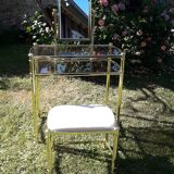 Vintage dressing table and golden metal stool