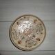 Hand decorated terracotta plate
