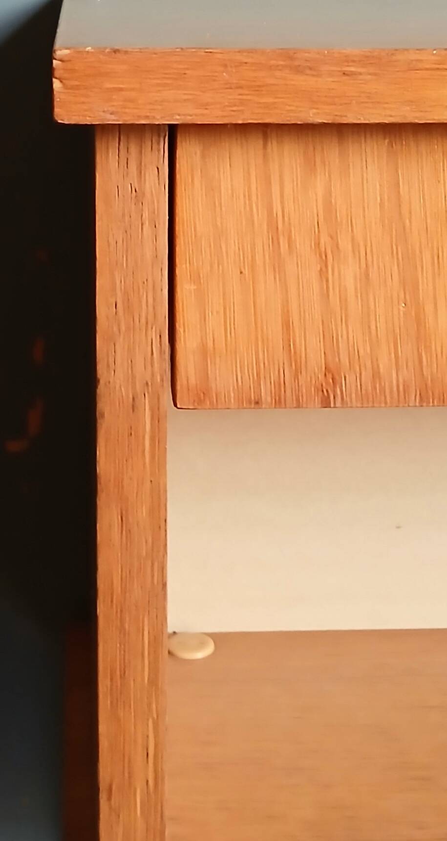 Nightstand in golden oak veneer. Around 1970.