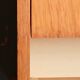 Nightstand in golden oak veneer. Around 1970.