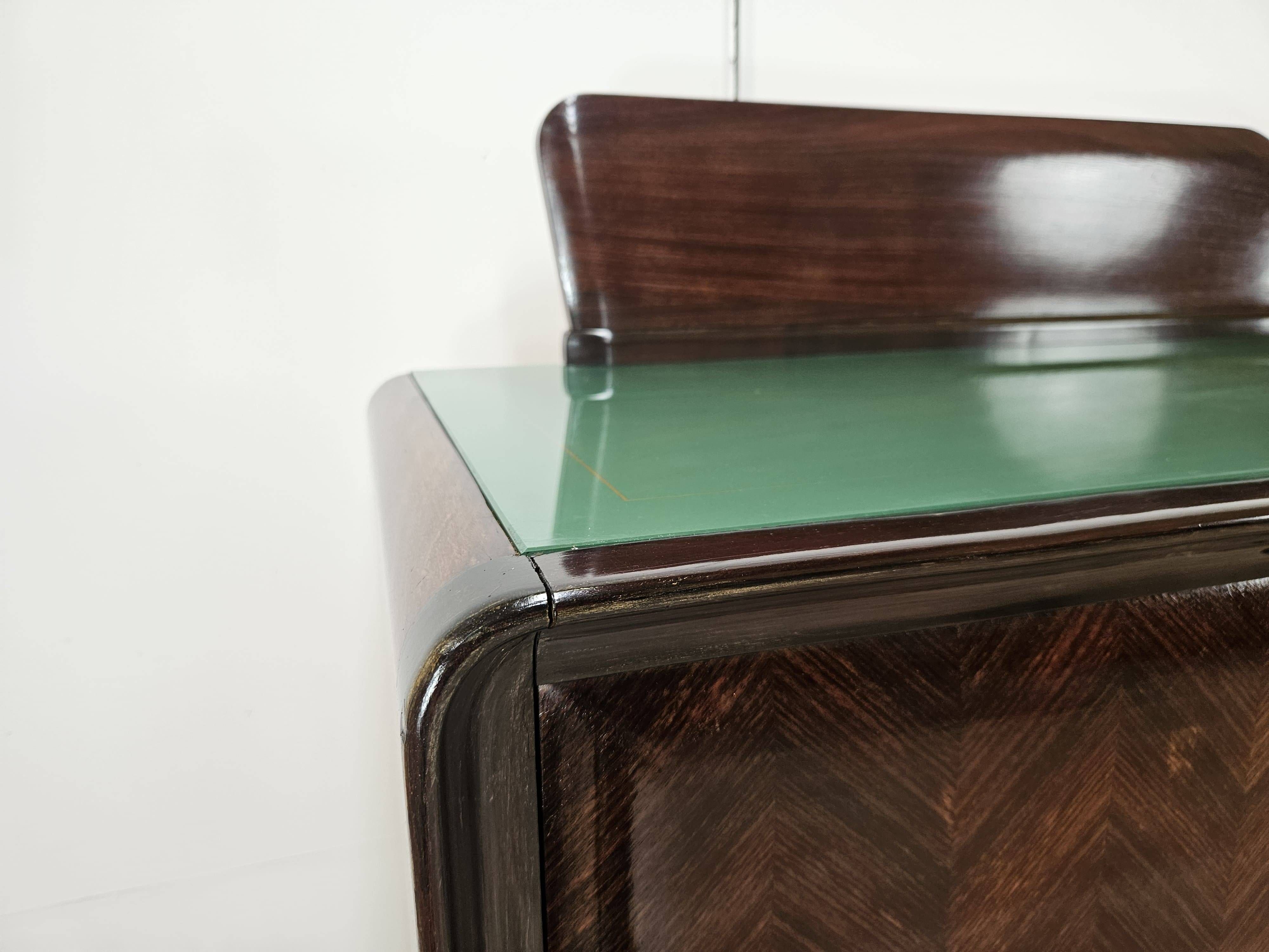 Mahogany sideboard with a glass top, 1960