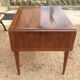 Louis XVI style table in rosewood with lemon tree inlay.
