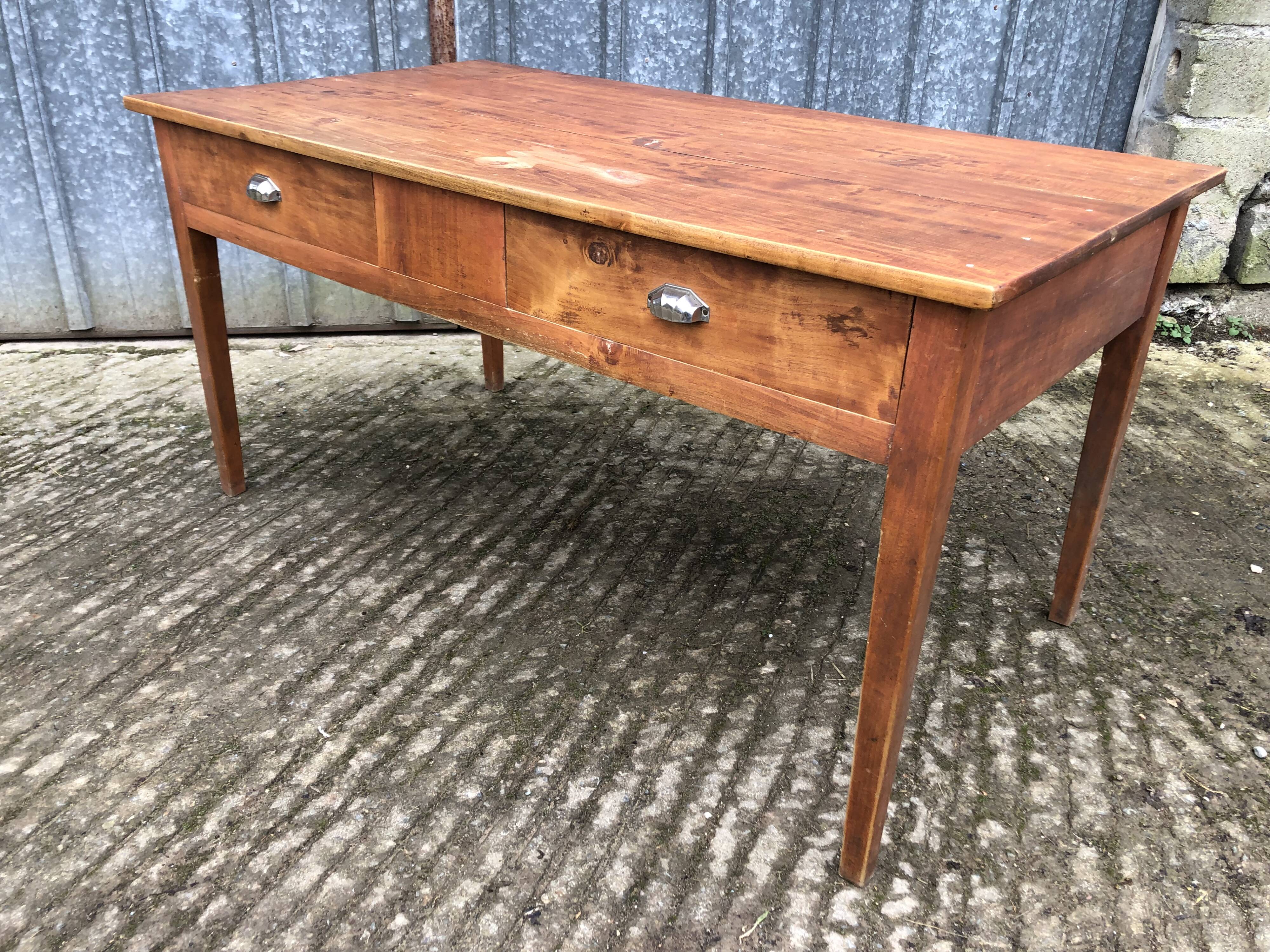 Poplar wood table with 2 front drawers from the Reconstruction period.