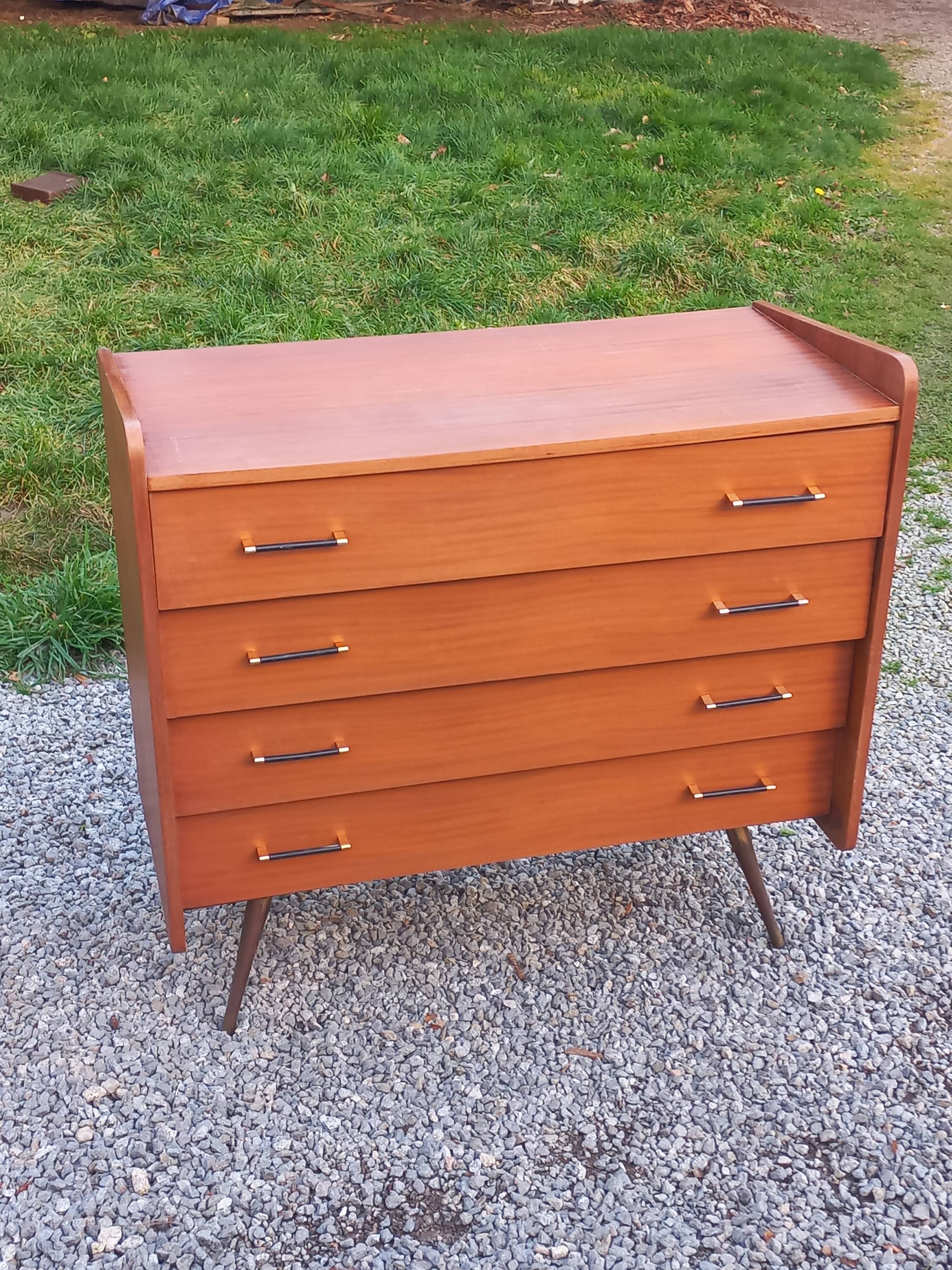 Vintage mahogany commode with metal tapered legs, 4 drawers, 1950s.