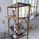 Rattan bookshelf and black glasses