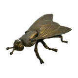 Old brass ashtray in the shape of a fly