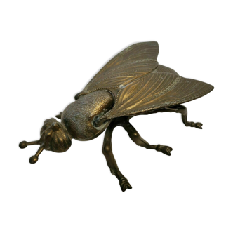 Old brass ashtray in the shape of a fly