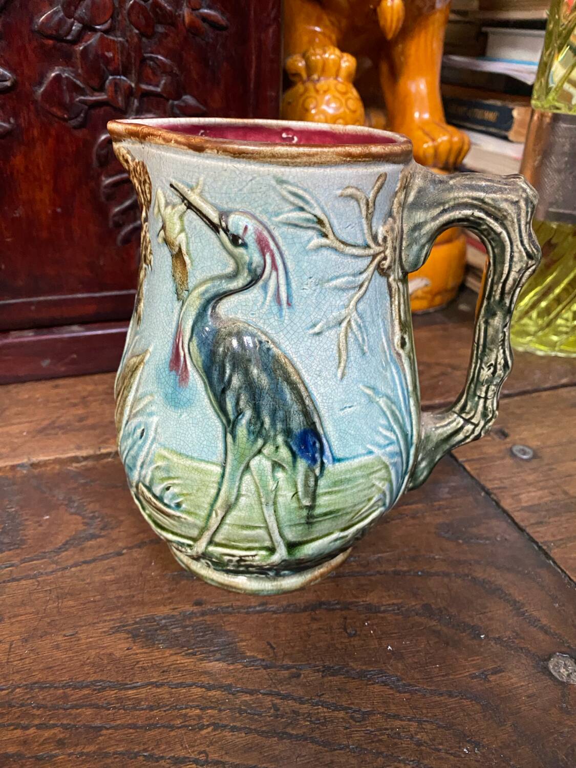 Majolica pitcher depicting a heron, 1900