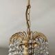 Small vintage brass chandelier with crystal droplets