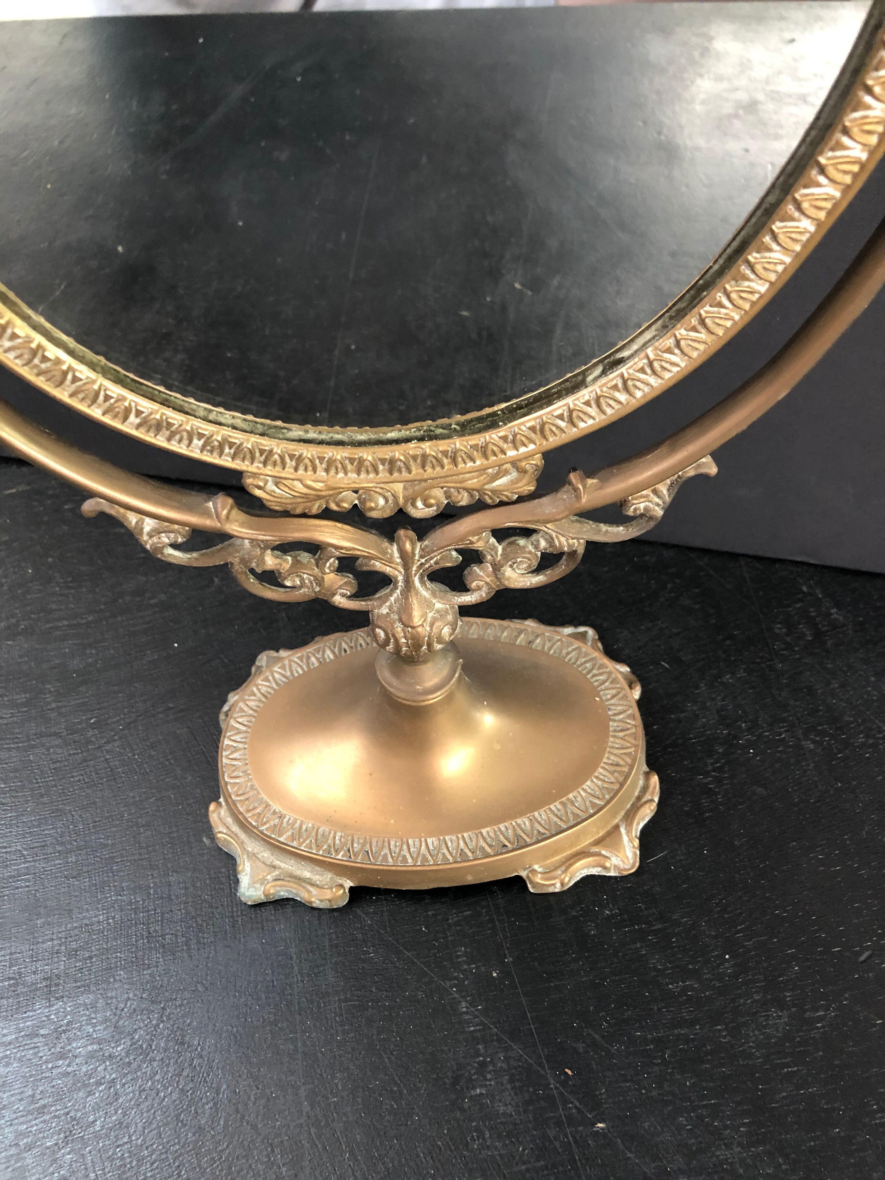 Swivel bronze mirror