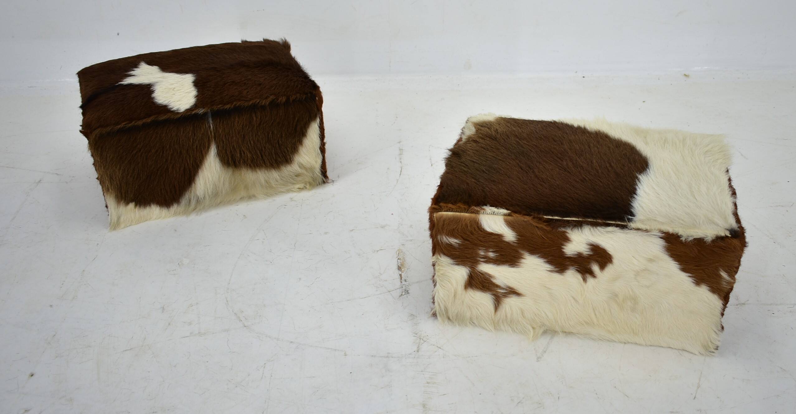 red brown leather cowhide footstools , poufs, 80s