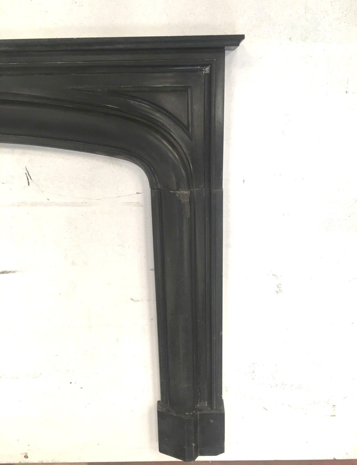 Old fireplace in black marble Louis Philippe