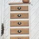 Vintage chiffonier with compass legs in solid raw wood with white patina