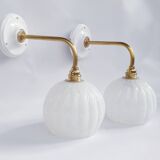 Brass and speckled glass wall lights from Clichy