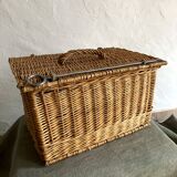 Antique wicker basket with closure and handle