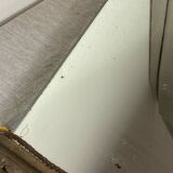 Antique wooden mirror with an unusual shape