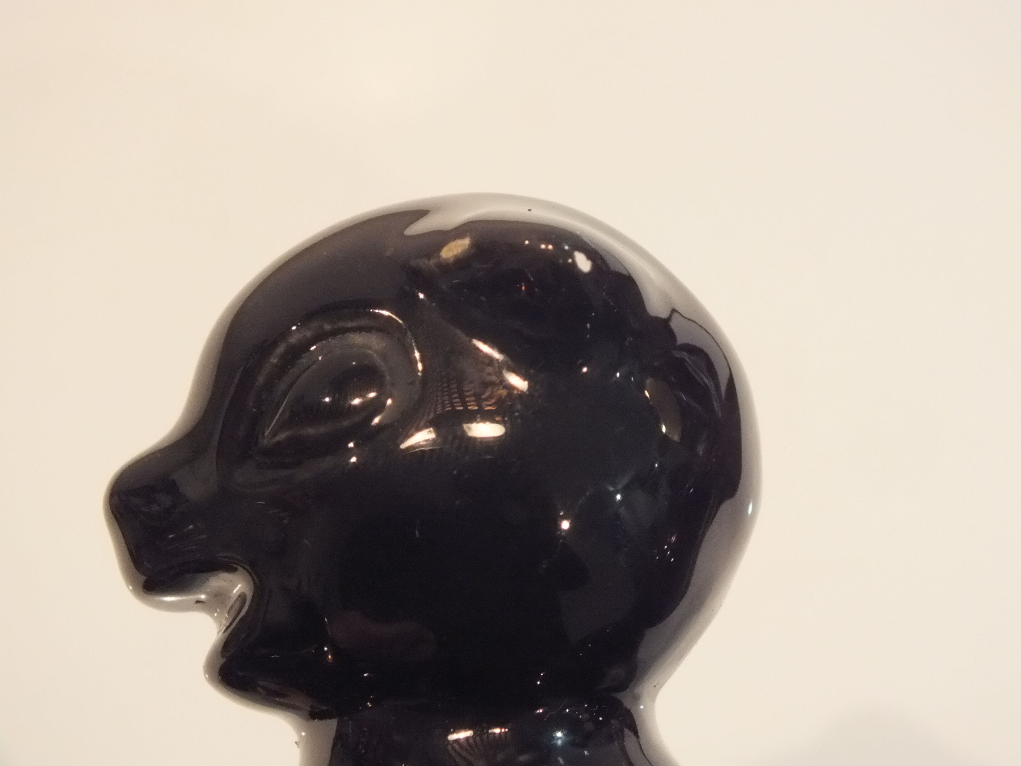 Black and gold ceramic squirrel pot cache from the 50s