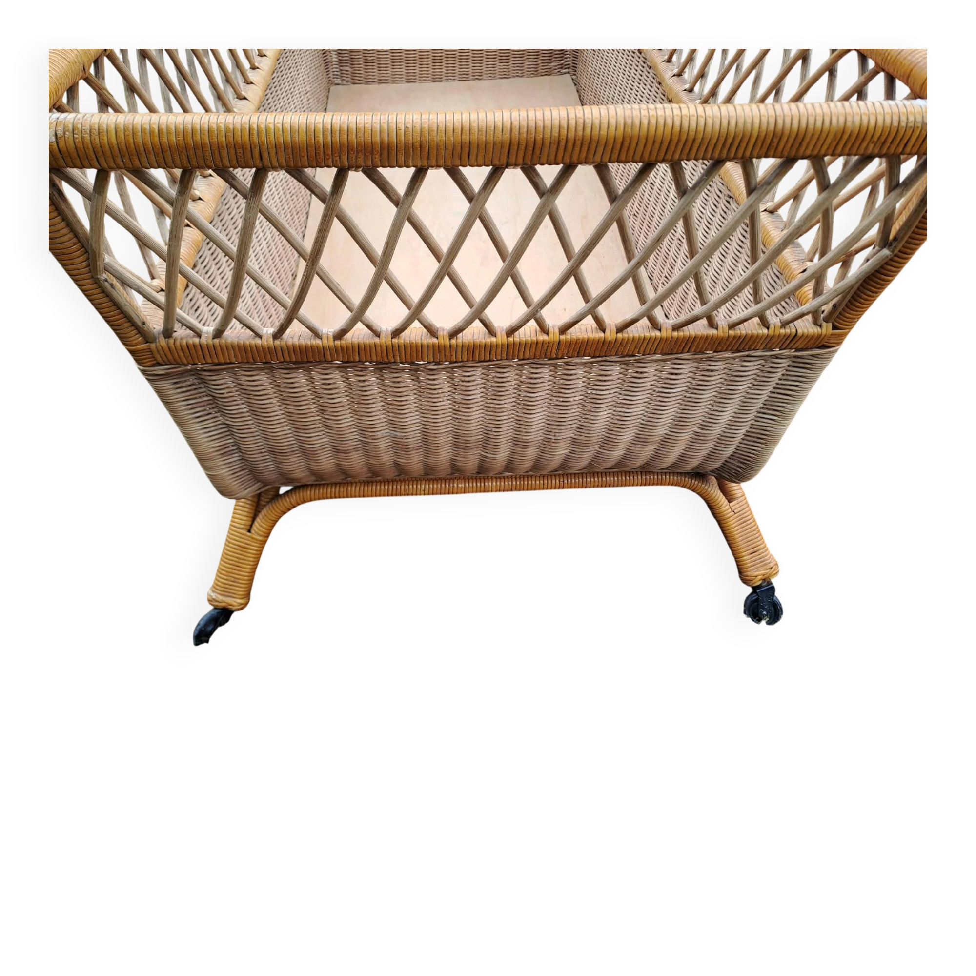 Rattan cradle.