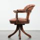 Classic and timeless cow leather and wooden Chesterfield office chair