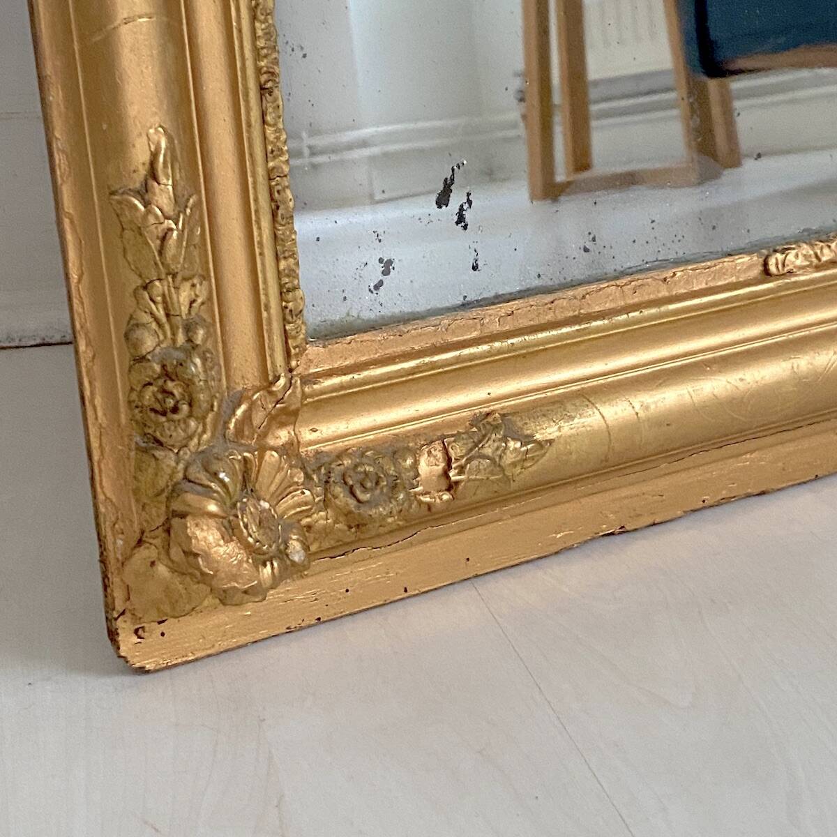 19th-century mercury mirror, in wood and gilded stucco