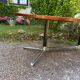 Vintage oval wooden and metal dining table from the 60s and 70s
