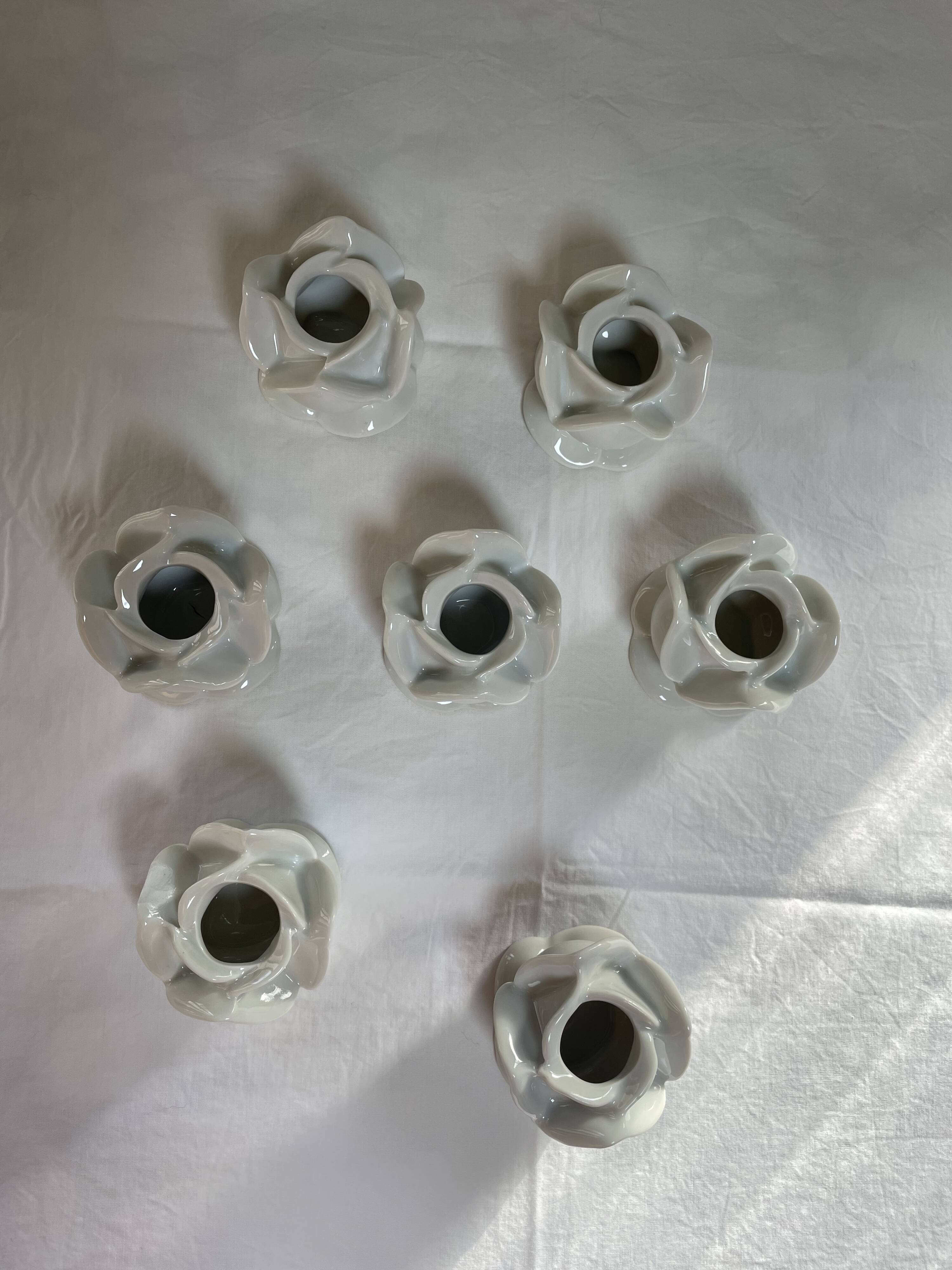 White porcelain rose shaped candle holders