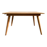 Dining table with tapered legs