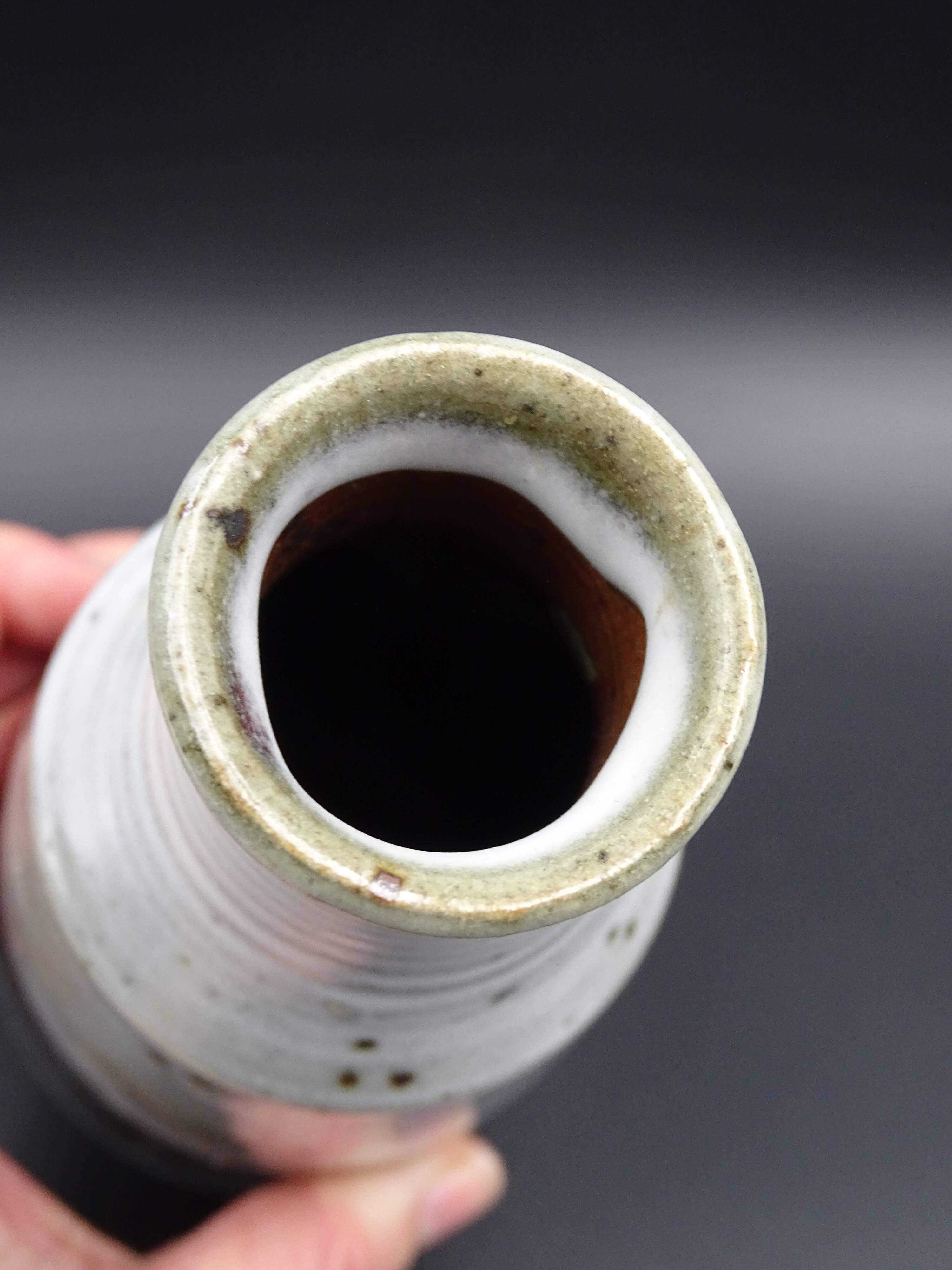 Sandstone vase with brown speckled decoration on a grey background - Bottle shape - Circa 1970 - Signed