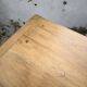 Oak farmhouse table with turned black legs.