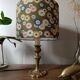 brass table lamp | khaki lampshade with multicoloured daisies