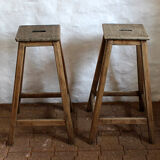 Pair of high workshop stools in raw wood