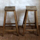 Pair of high workshop stools in raw wood