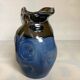 Iridescent modernist vase by Thomas Buxo