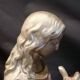Statuette of a woman in gilded cast iron (Joan of Arc?)