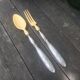 Silver and ivory salad cutlery in early 20th century