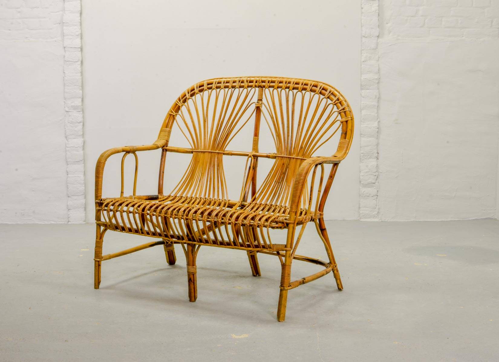Elegant Rohé Style Vintage Design Rattan Bamboo Two-Seat Patio Sofa, 1950s.