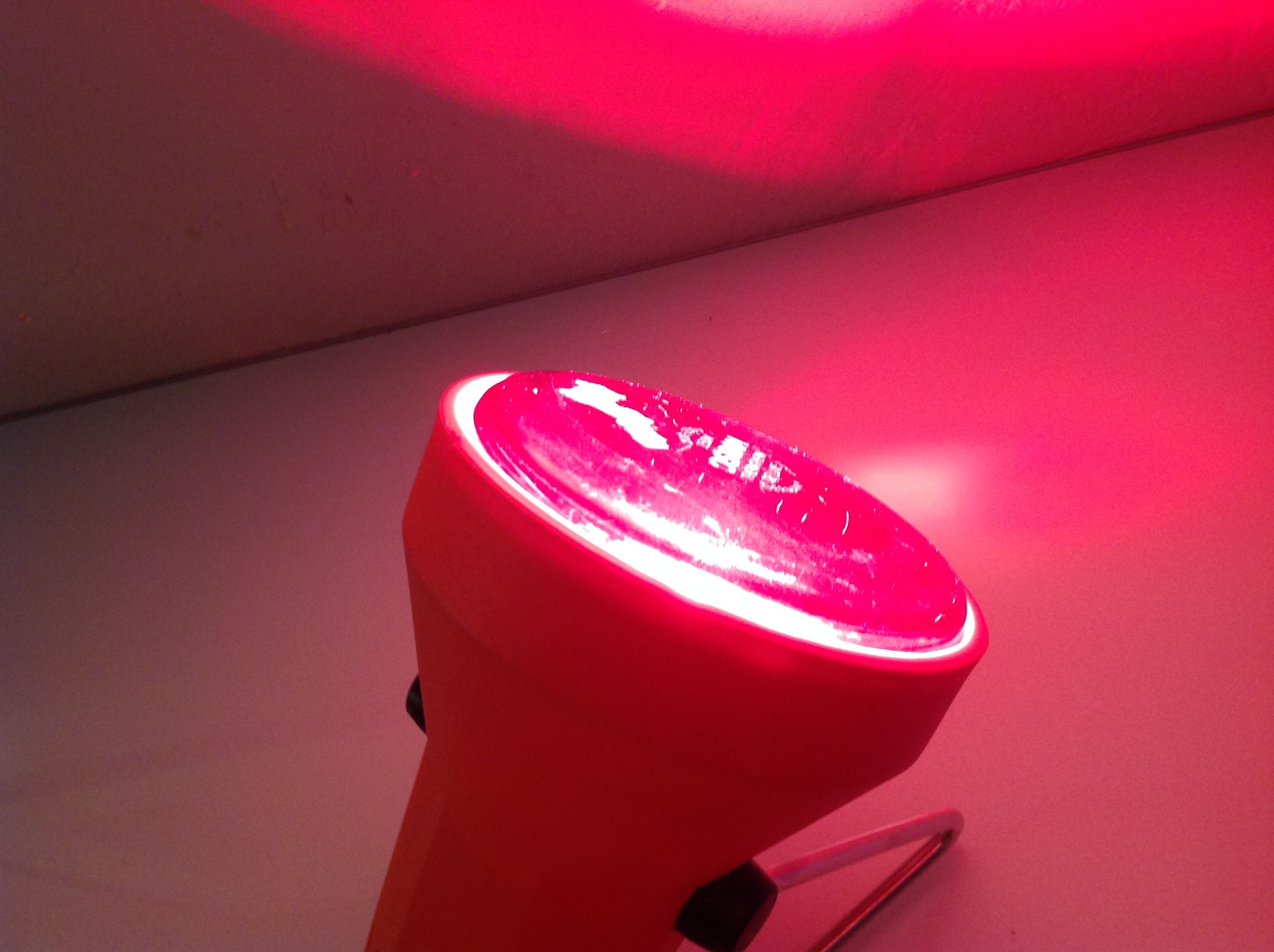 Orange infrared lamp by Condel / vintage 70s