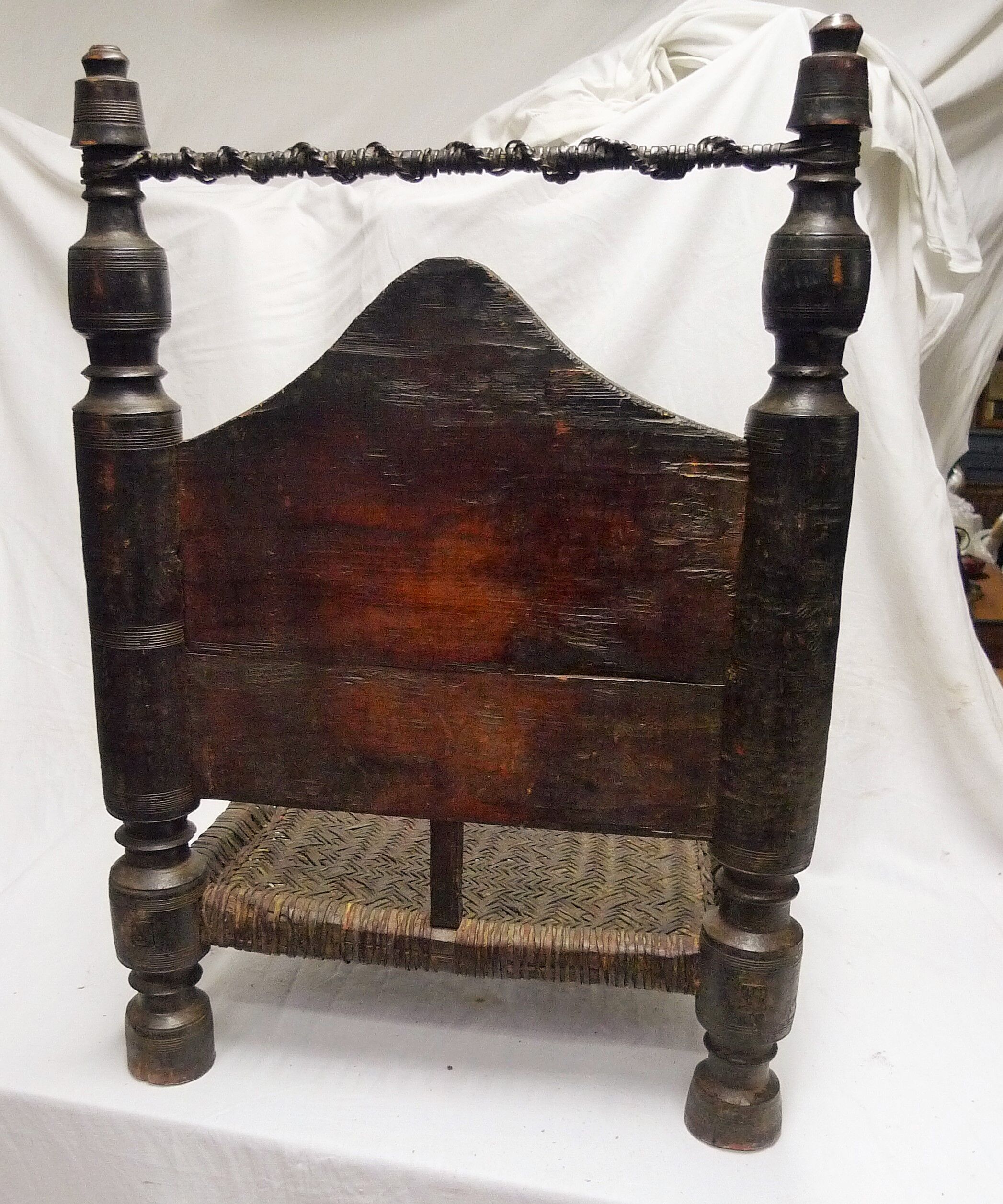 Traditional low chair in wood and leather