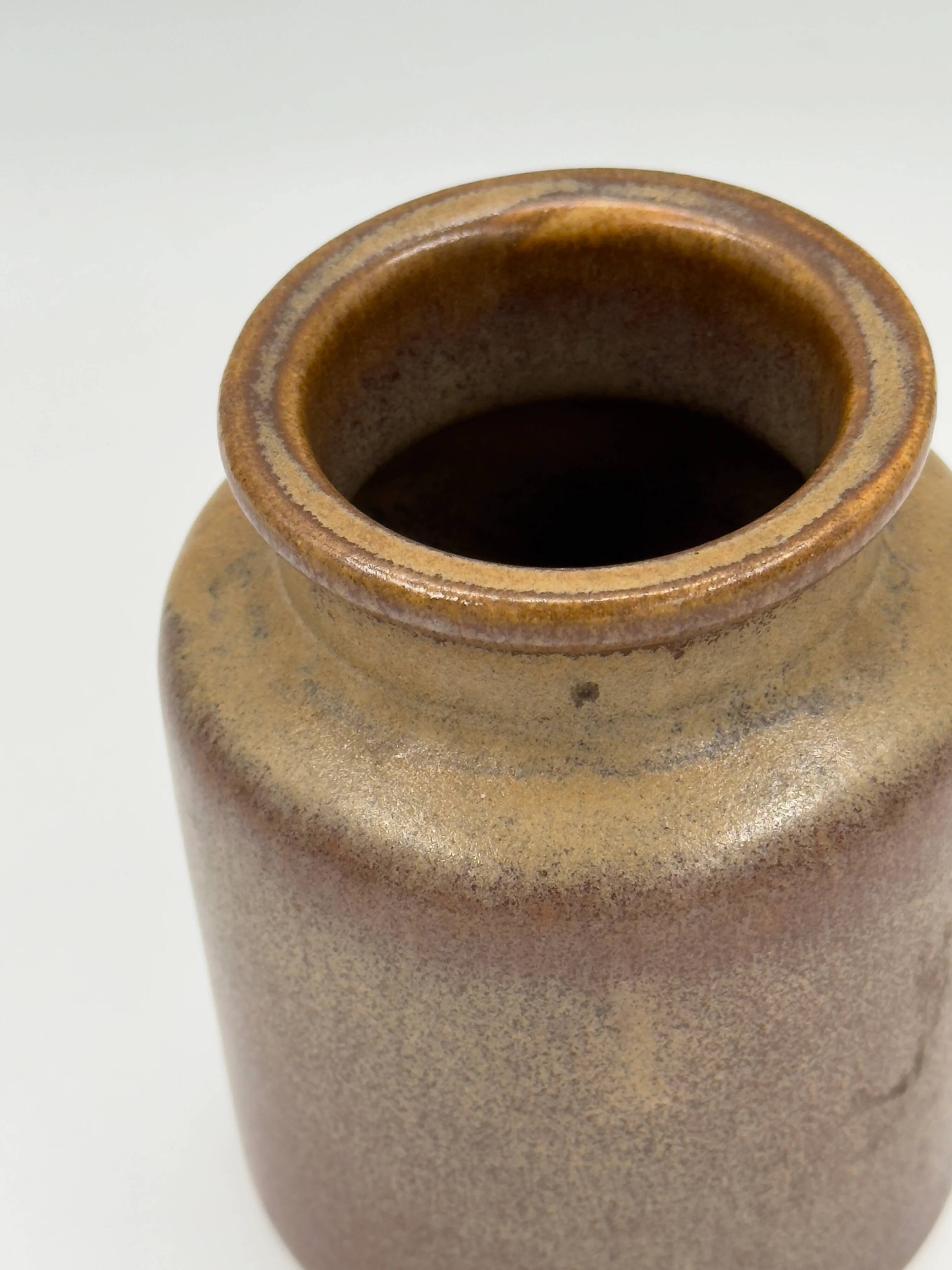 Vintage cylindrical ceramic workshop vase with speckled brown glaze.