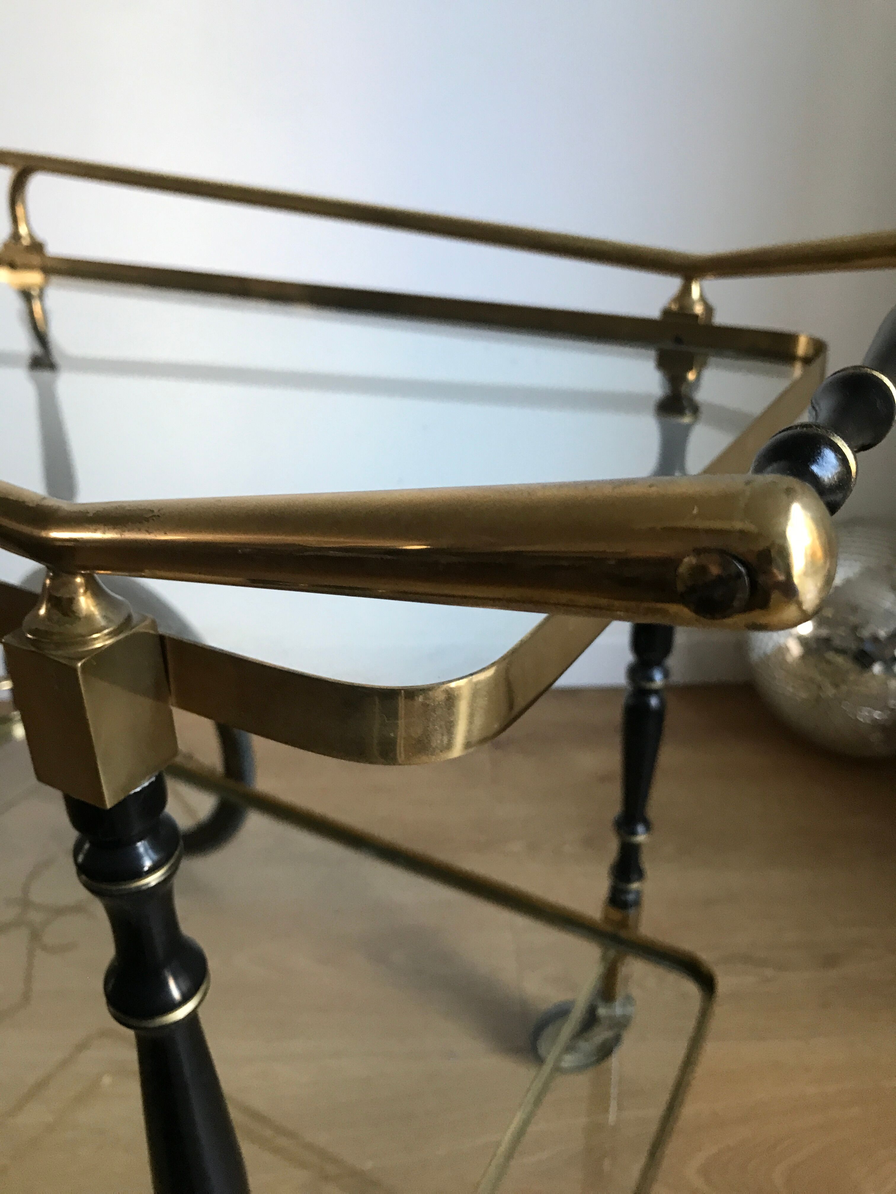 Vintage rolling golden and black dessert in brass and glass