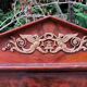 Mahogany pediment mirror with Empire-style cariatids. Return from Egypt